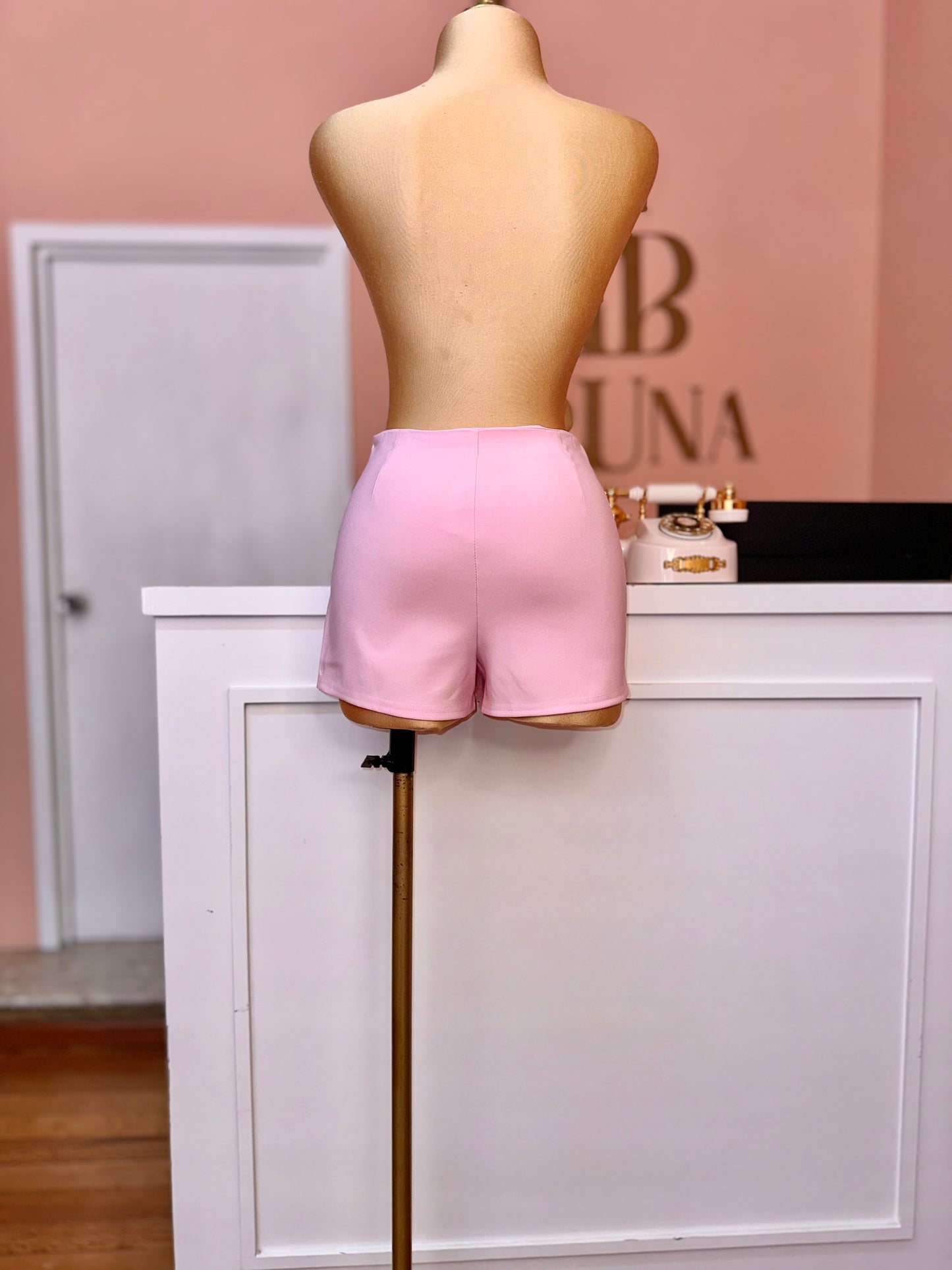 Falda rosa moño